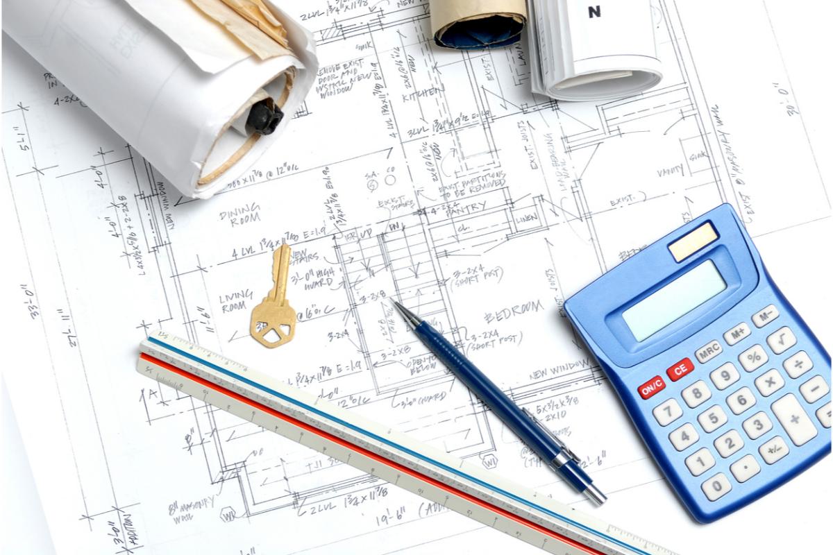 blueprints stock photo with ruler, calculator, and key